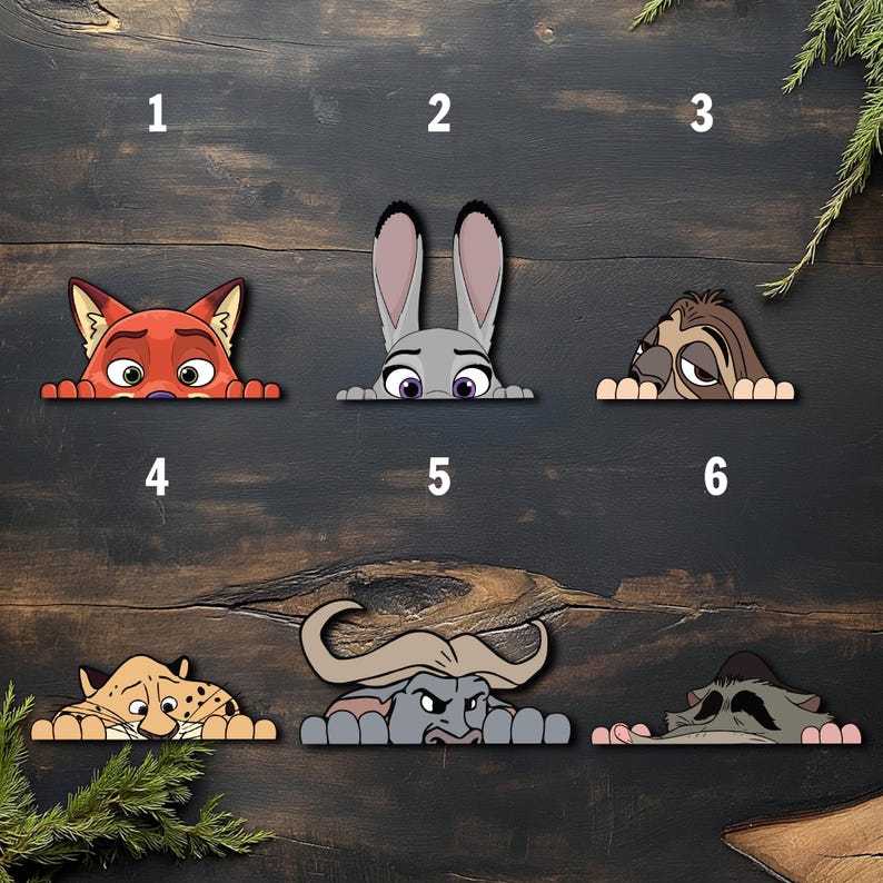 May include: A collection of six cartoon animal character cutouts, including a fox, rabbit, sloth, cheetah, buffalo, and raccoon. Each character is depicted from the chest up, peeking over a surface. The characters are in various colors and have detailed facial features.