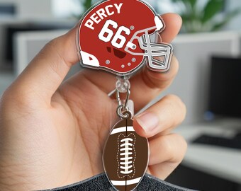 Carrete de insignia con nombre y número de camiseta de fútbol personalizada, carrete de insignia de jugador deportivo con casco de fútbol personalizado, regalo para entrenador, insignia holográfica SL1B01