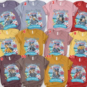 May include: A collection of short-sleeved t-shirts in various colors, each featuring a cartoon character design with the words "Graduation Cruise" and "Custom Name". The designs include characters like Donald Duck, Mickey Mouse, and Winnie the Pooh.