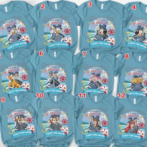 May include: A collection of light blue t-shirts featuring various cartoon characters in graduation attire. Each shirt has the words "Graduation Cruise" and "Custom Name" printed on it, along with nautical-themed graphics.