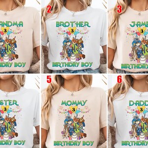 May include: A collection of six short-sleeved t-shirts in white or beige, each featuring a graphic print of various animated animal characters, a yellow number 3, colorful party bunting, and the text BIRTHDAY BOY with a specific family title.