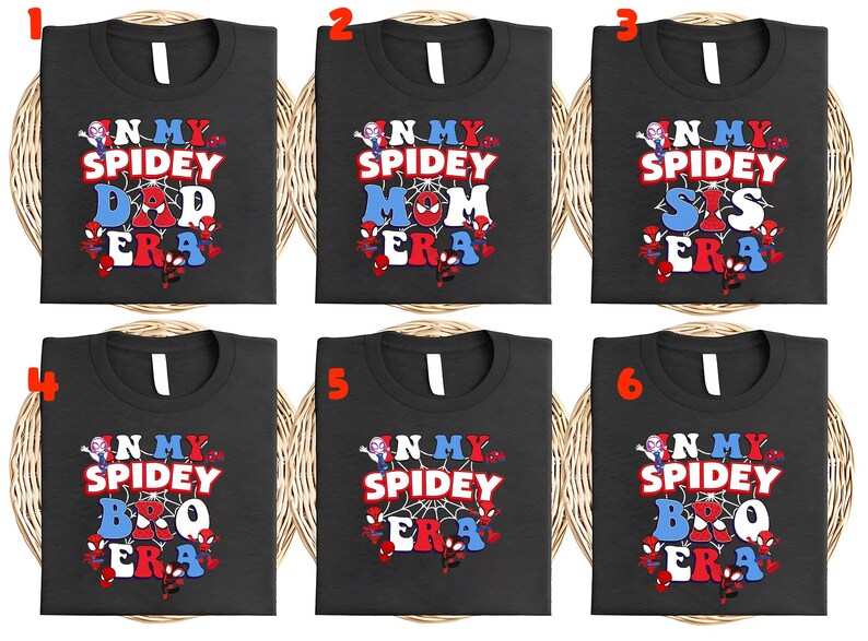 May include: Six black t-shirts with white crew necks, each featuring a colorful "N My Spidey Era" design. The designs include "Dad," "Mom," "Sis," "Bro," and two blank options, all with Spider-Man graphics.