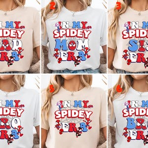 May include: A collection of six t-shirts with the text "IN MY SPIDEY ERA" and different words: Dad, Mom, Sis, Bro. The design features a spider web and Spider-Man characters in red, white, and blue.