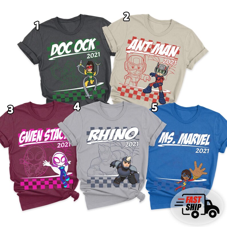 May include: Five graphic t-shirts featuring comic book characters. Designs include "Doc Ock," "Ant-Man," "Gwen Stacy," "Rhino," and "Ms. Marvel," each with the year "2021." The shirts are in various colors, including gray, tan, burgundy, and blue.