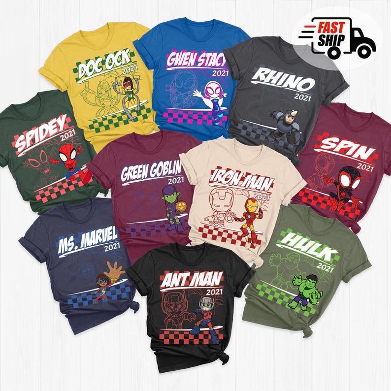 May include: A collection of colorful t-shirts featuring various Marvel characters. Each shirt displays a character's name and the year 2021, with designs including Doc Ock, Spidey, Gwen Stacy, Rhino, Iron Man, Ant Man, Spin, Hulk, and Ms. Marvel.