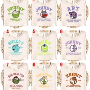 May include: Nine cream-colored t-shirts with various cartoon character designs and text. Each shirt features a different character's name, the year 2025, and a grade-related phrase. The designs include monsters and other animated figures in various colors.