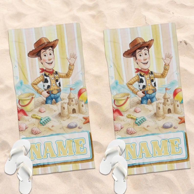 May include: Two rectangular beach towels featuring a cartoon cowboy character in a brown hat, yellow shirt, and cow-print vest. The design includes a sandcastle, beach toys, and a rectangular box at the bottom with the word NAME in yellow letters.
