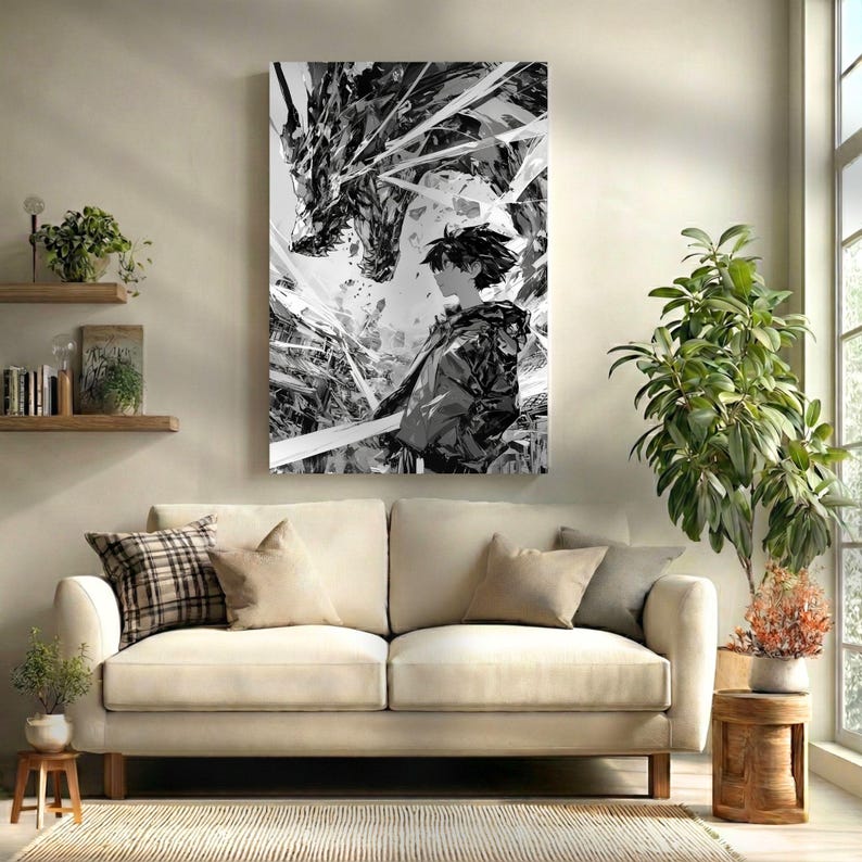 May include: Black and white artwork of a person facing a dragon. The dragon is depicted with sharp, angular features, and the person is in a dynamic pose. The artwork is displayed above a cream-colored sofa.