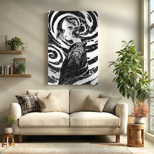 May include: Black and white artwork of a woman with short, curly hair, set against a swirling background. The artwork is displayed on a wall above a cream-colored sofa. The woman is wearing a patterned garment.