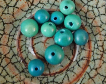 Tagua Perle oval türkis 36mm 1 Stück