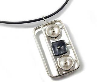 Geometrics in Motion Dark and Light Finish Rectangular Pendant