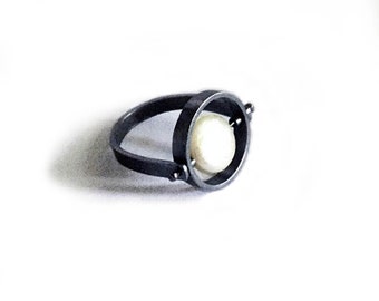 Sterling Silver Rotating Circle Ring with a Dark Patina and a White Coin Pearl