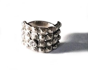 Sterling Silver Geometric "Patchwork" Ring with a light antique and a Tube Set Cubic Zirconia