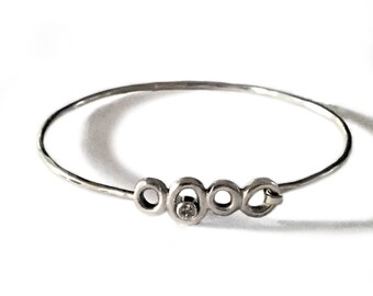 Sterling Silver Four Circles Hooked Bracelet with Cubic Zirconia