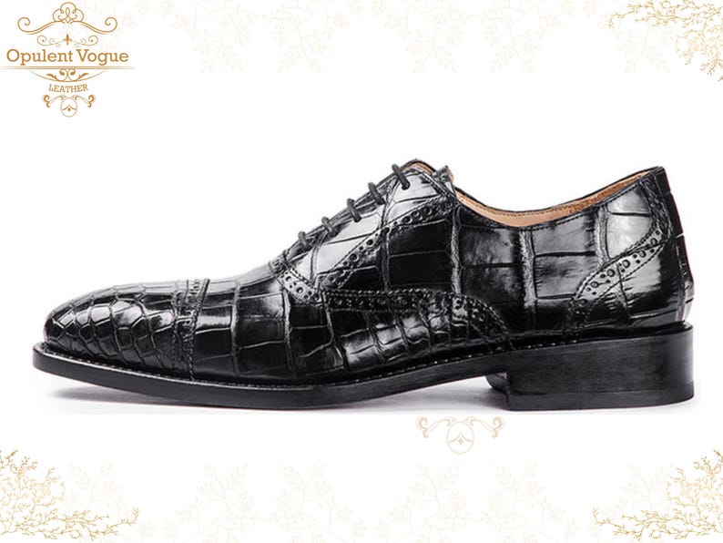 Handmade men’s black crocodile-style textured leather lace-up dress shoes with a polished finish. Crafted with genuine leather upper, cushioned insole, leather lining, and durable outsole for all-day comfort and support. Designed for weddings, parties, office wear, and formal business occasions. A premium handmade shoe that blends luxury, craftsmanship, and timeless sophistication for modern gentlemen. mens formal shoes
wedding shoes men
party wear shoes
business shoes men
polished dress shoes