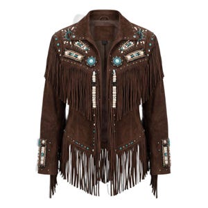 May include: A dark brown suede jacket featuring long fringe detailing across the chest and hem. The garment is embellished with turquoise beads, white stones, and metallic studs arranged in geometric patterns on the shoulders and cuffs.