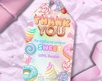 May include: A pastel-colored gift tag with a candy theme. The tag says "THANK YOU" in a donut-style font, with the words "SWEET" and "LOVE, Scarlett" below. The tag is decorated with illustrations of donuts, lollipops, and ice cream.