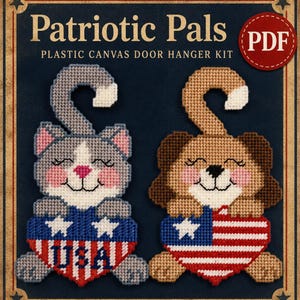 May include: A plastic canvas door hanger kit titled Patriotic Pals featuring a gray cat and a brown dog, each holding a heart with American flag patterns. The cat heart displays the text USA. The design includes a hook for hanging on a door.
