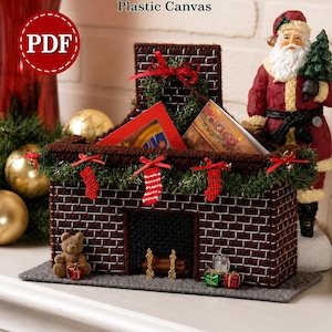 May include: A plastic canvas fireplace card holder featuring a brown brick pattern, a black hearth, a green garland with red bows, and miniature stockings. The text reads FIREPLACE CARD HOLDER, Plastic Canvas, and PDF. It is a decorative holiday item.