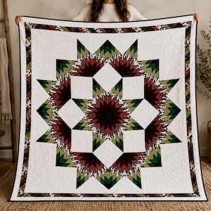May include: A square quilt featuring a central star pattern in shades of deep burgundy, forest green, and olive green. The design includes white geometric sections and a border with a mottled pattern in matching colors, finished with a dark trim.