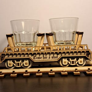 Portavasos de chupito cortado con láser Vagón de tren