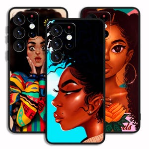 May include: Three phone cases showcasing illustrations of Black women. The cases display portraits with vivid colours, including a woman with a surprised expression, a profile against a blue sky, and a woman with a rose.