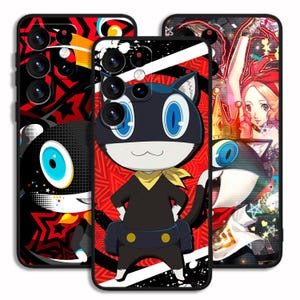 May include: Three phone cases with vibrant anime-style character designs. The central case features a black cat character with a yellow scarf against a red and white backdrop. The other cases display similar character art.