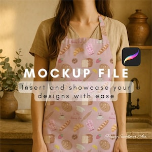 May include: A pink apron with a repeating pattern of baked goods, including croissants, bread, and cookies. The apron has the text "Mockup File" and "Insert and showcase your designs with ease". The apron is being worn.