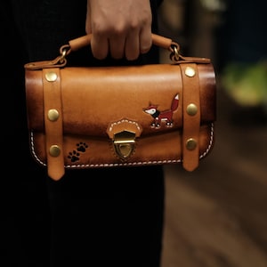 Handmade Leather Fox Print Shoulder Bag - Unique Animal Design Handbag with Paw Print The handmade leather bag is highly customizable