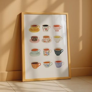Puede incluir: Una lámina de arte mural enmarcada que presenta una cuadrícula de doce tazas de té ilustradas con diversos colores y patrones, incluyendo diseños florales, de lunares y lisos, dispuestos en cuatro filas de tres sobre un fondo blanco.