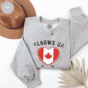 Camiseta "Codos en alto Canadá", "Canadá orgulloso", "Canadá fuerte", "Hoja de arce", "Independencia canadiense", "Hecho en Canadá", "Democracia", "Anti-Trump", "Política"