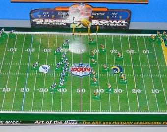 Special Edition "Art and History of ELECTRIC FOOTBALL" SBXXXIV Rams vs. Titans Electric Football Game Set