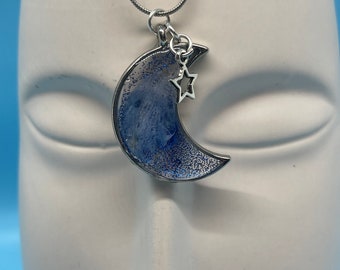 Resin pendant, I love you to the moon and back, silver plated chain, crescent moon shaped frame, with glitters, accented with star charm.