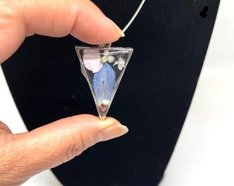 Resin pendant, silver-plated triangular frame with light blue and soft pink pretty pressed flowers on silver-plated chain.