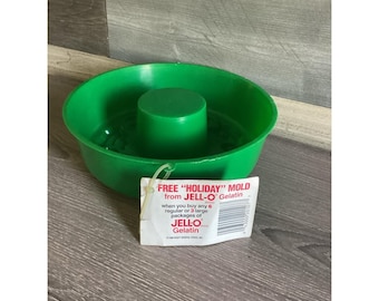 Molde de gelatina navideño vintage verde de 1990 con etiquetas aún adjuntas Jell-O