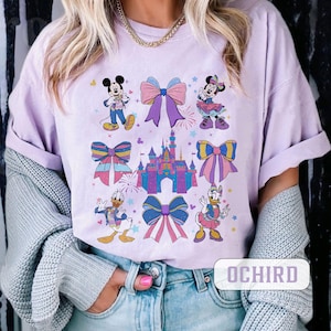 Coquette Bows Mickey and Friends Disneyland 70th Anniversary Shirt, 70 Years of Magic Shirt, Disneyland Tee, Disney Platinum Celebration Tee