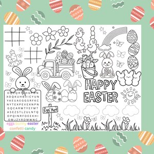 May include: A black and white printable coloring page with an Easter theme. The page features a truck filled with Easter eggs, a bunny rabbit holding a sign that says "Egg Hunt", a bucket of carrots, a rainbow, a sun, and the words "Happy Easter".
