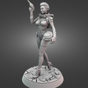 May include: A gray figurine of a woman in a futuristic space suit, holding a ray gun and a helmet. The figure is standing on a circular base with a cracked texture. The woman is wearing a form-fitting outfit.