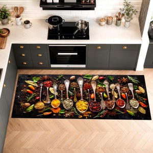 May include: A rectangular kitchen floor mat featuring a high-resolution print of various metal spoons filled with colorful spices, dried herbs, and peppercorns arranged on a dark, textured background, placed on a light wood floor.