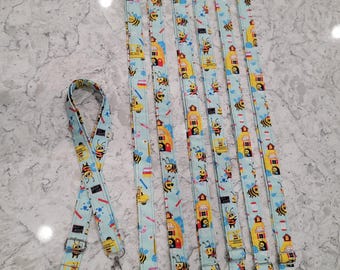 School Bees adjustable lanyard, with two clips and a key ring.