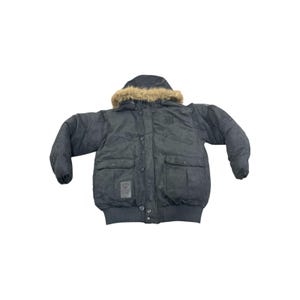 May include: A dark gray winter jacket with a fur-lined hood. The jacket has a bomber-style design with multiple pockets, a ribbed hem, and button closures. A logo is visible on the chest and a patch on the lower left side.