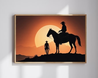 Pode incluir: Uma impressão emoldurada com uma silhueta de um cowboy a cavalo e outro em pé, contra um pôr do sol. A obra de arte usa tons de laranja e preto, evocando um tema ocidental.