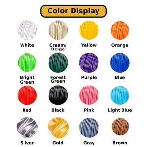 a color display with various colored wire strands, including white, cream/beige, yellow, orange, green, bright green, forest green, purple, blue, red, black, pink, light blue, silver, gold, gray, and brown.