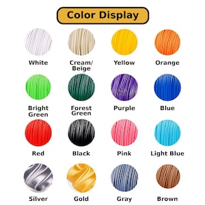 a color display with various colored wire strands, including white, cream/beige, yellow, orange, green, bright green, forest green, purple, blue, red, black, pink, light blue, silver, gold, gray, and brown.