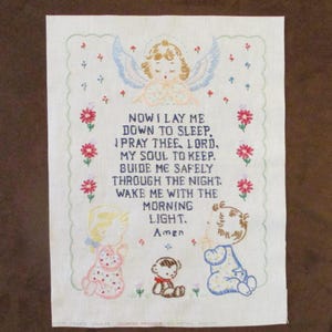 May include: A handmade, wooden cutting board with a natural finish. The board features a juice groove and a handle for easy carrying. Dimensions are approximately 18 inches long, 12 inches wide, and 1 inch thick.