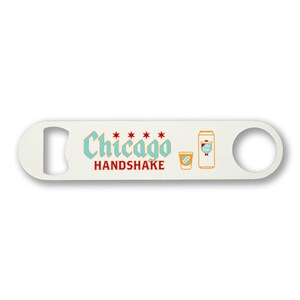May include: White metal bottle opener with a blue and red logo that says "Chicago Handshake" and a graphic of a beer can and shot glass.