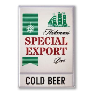 May include: A white and green rectangular sign with the text "Heilemans Special Export Beer" in red and black lettering. The sign also features a green ship with white sails and a compass. The bottom of the sign reads "Cold Beer" in black lettering.