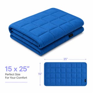 May include: Folded blue quilted blanket, measuring 38 x 64 cm. The blanket has a grid pattern and a label on the corner. The text on the image says "Perfect Size For Your Comfort".