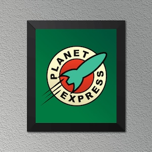 May include: A framed square print featuring a circular logo with a cream background, a red center, and a teal rocket ship graphic. The text PLANET EXPRESS is printed in black capital letters along the circular border, set against a dark green field.