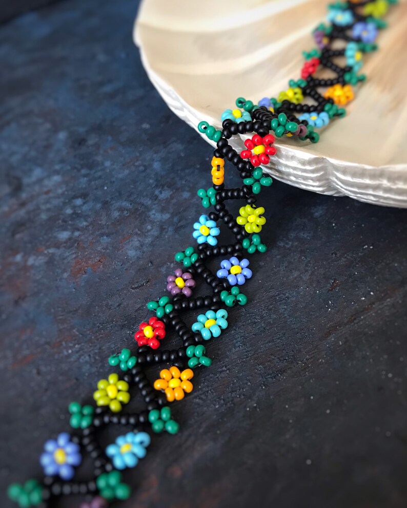 THE DAISY NEVER TAKE OFF BRACELET